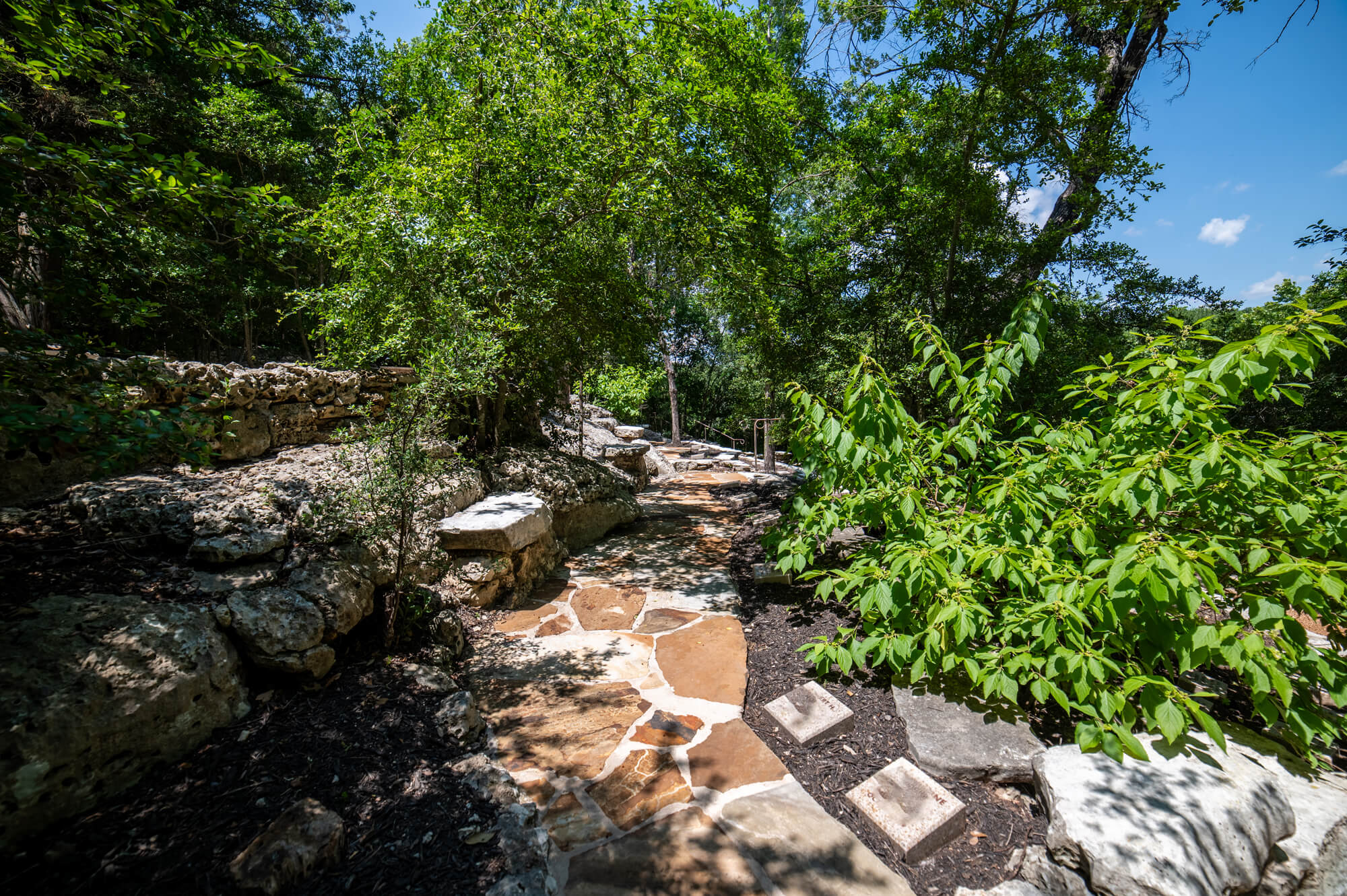 Stone pathway through Remembrance Gardens in Austin, Texas