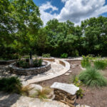 Trees and garden paths at Remembrance Gardens in Austin, Texas