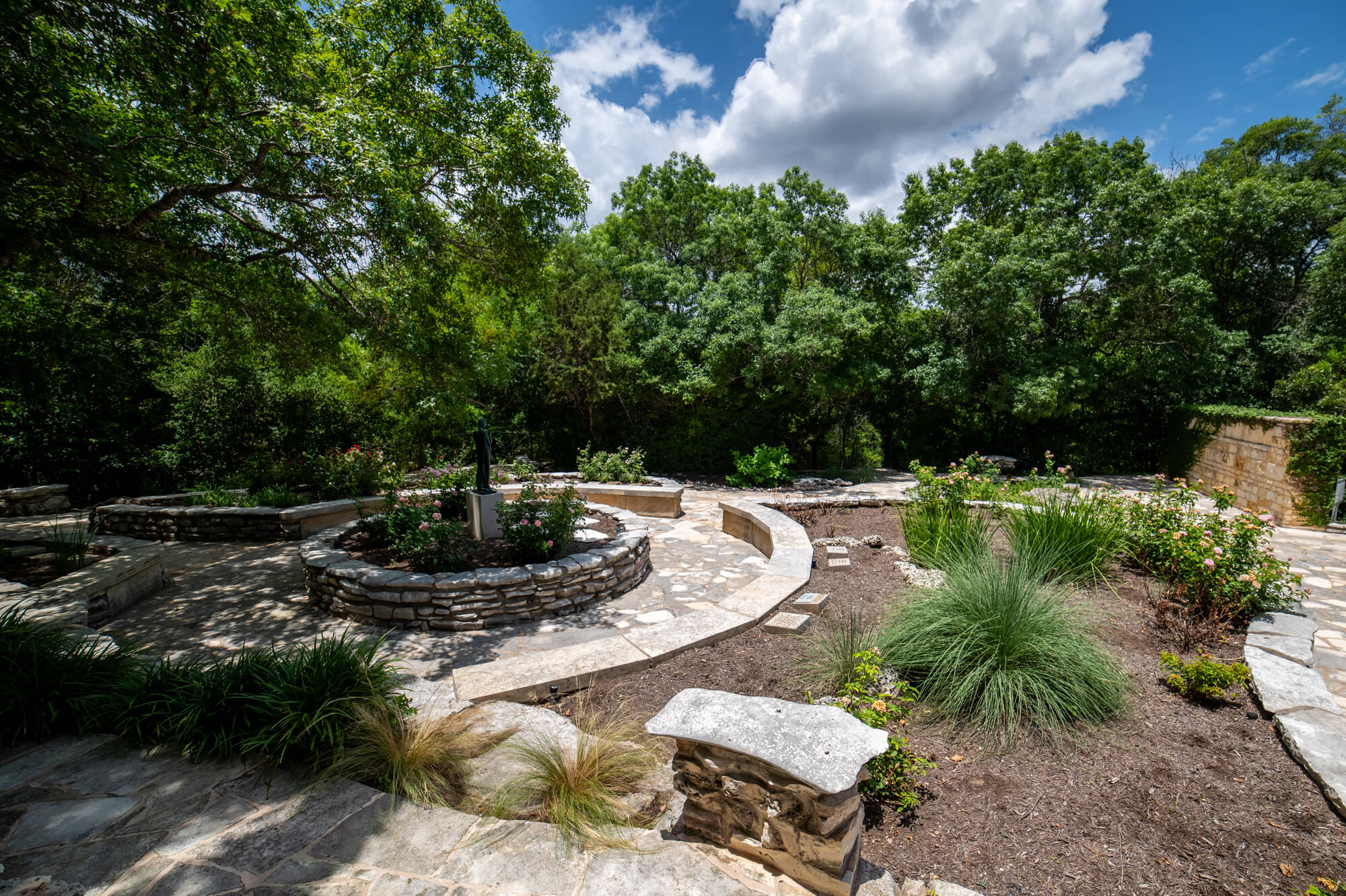 Trees and garden paths at Remembrance Gardens in Austin, Texas