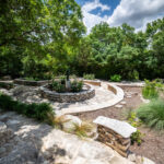 Trees and garden paths at Remembrance Gardens in Austin, Texas